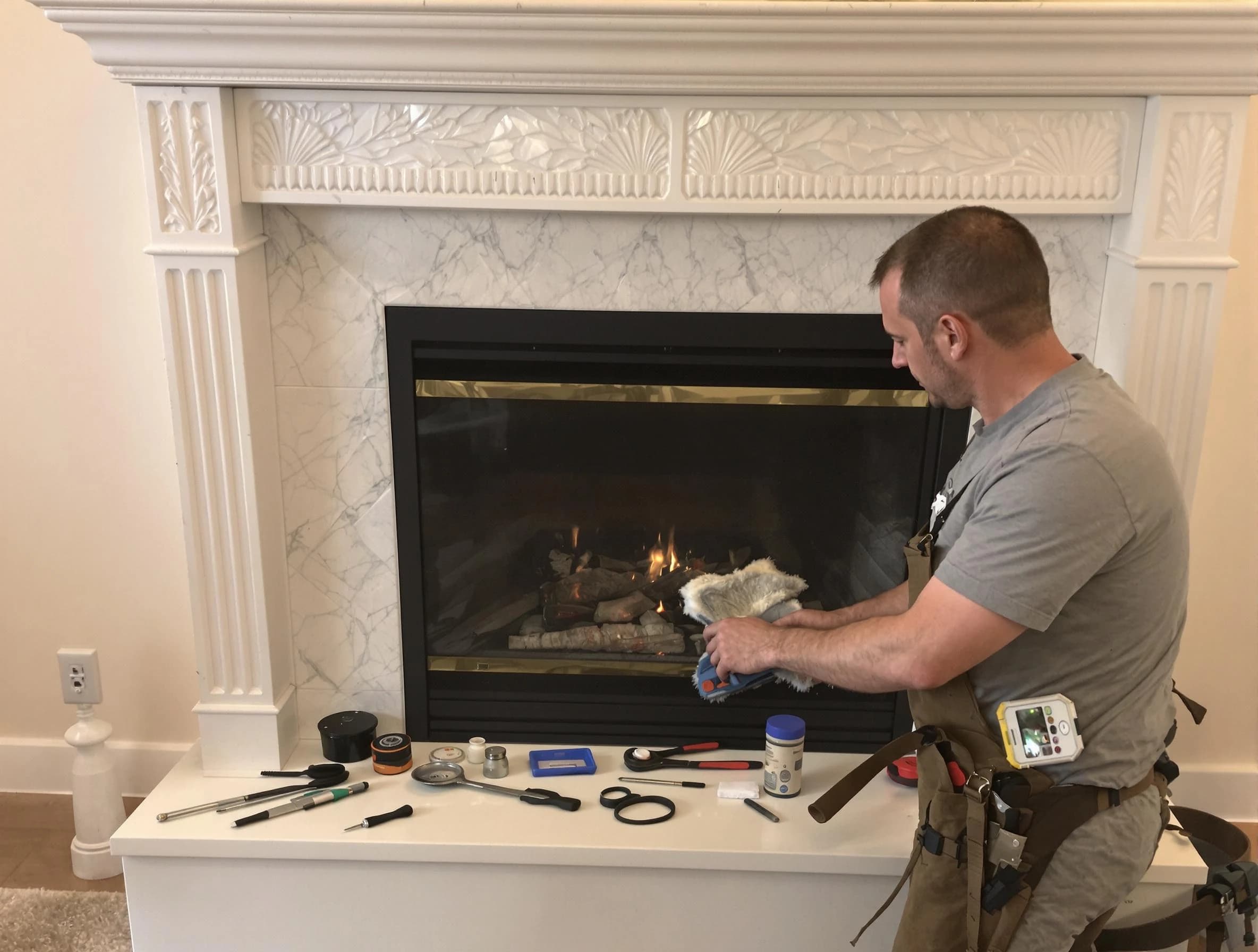 Middleborough Chimney Sweep performing fireplace maintenance in Middleborough, MA